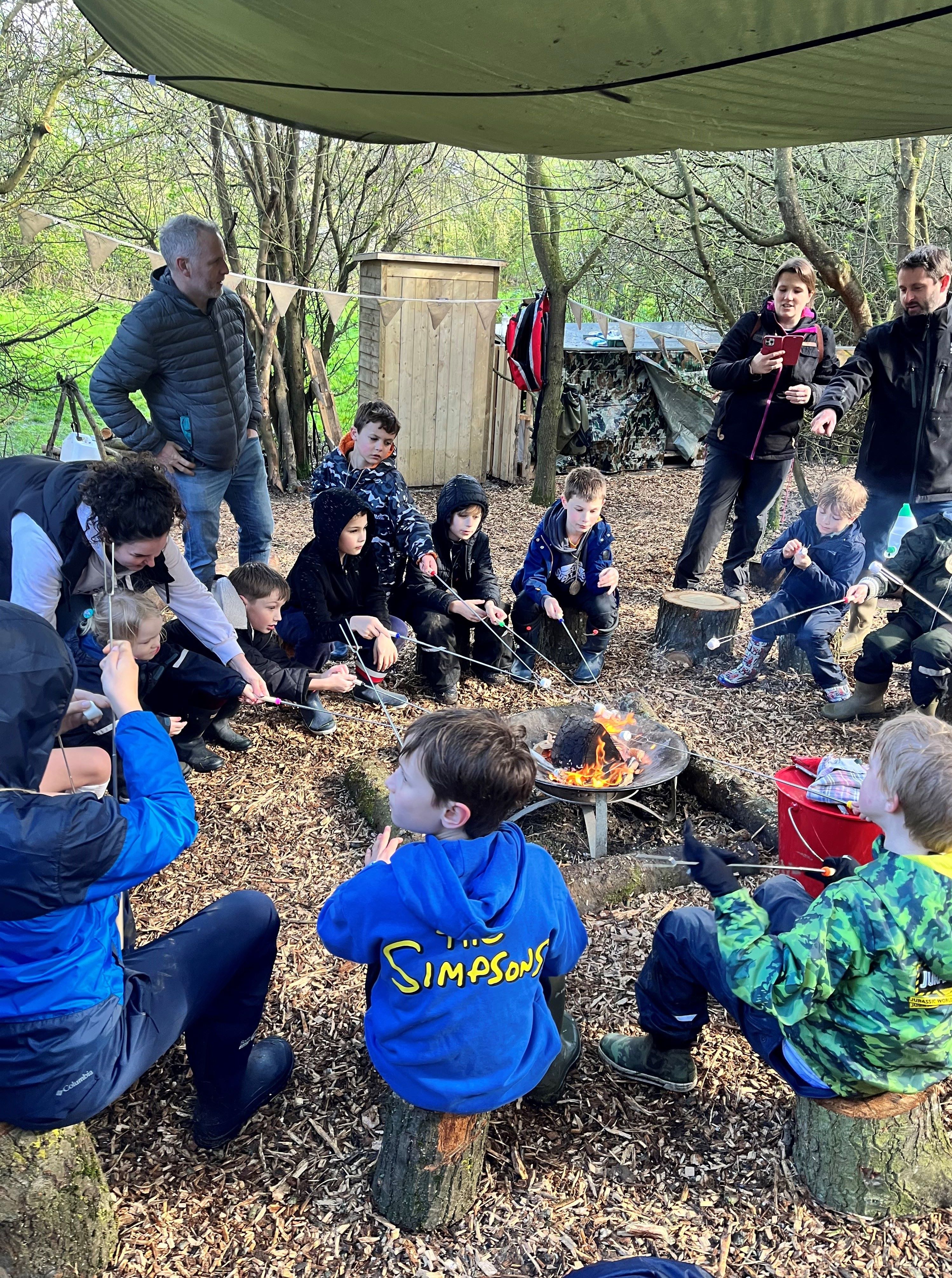 Toasting marshmallows round the firepit