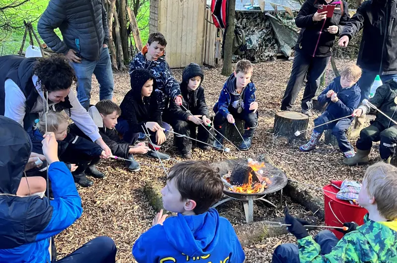 Toasting marshmallows round the firepit